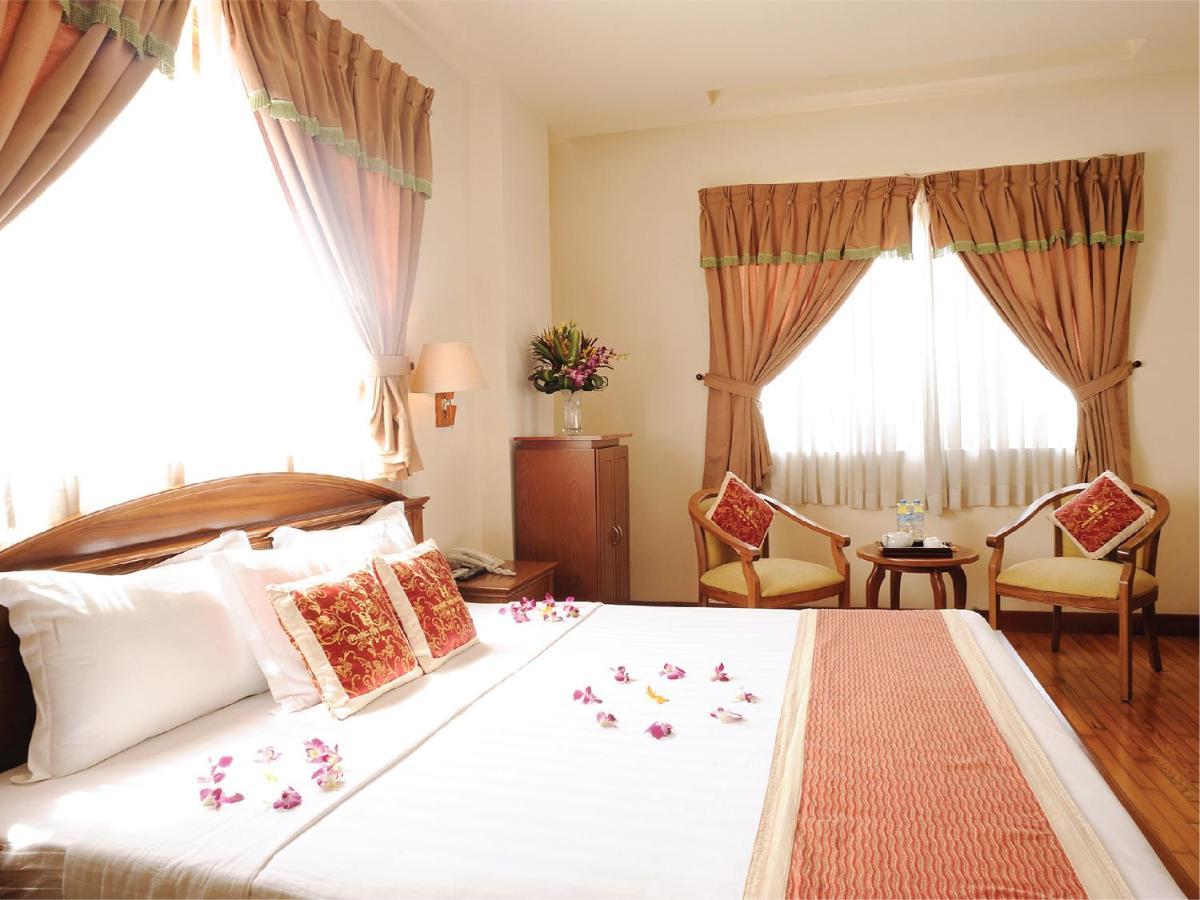Hoang Yen Hotel Thuan An Chambre photo